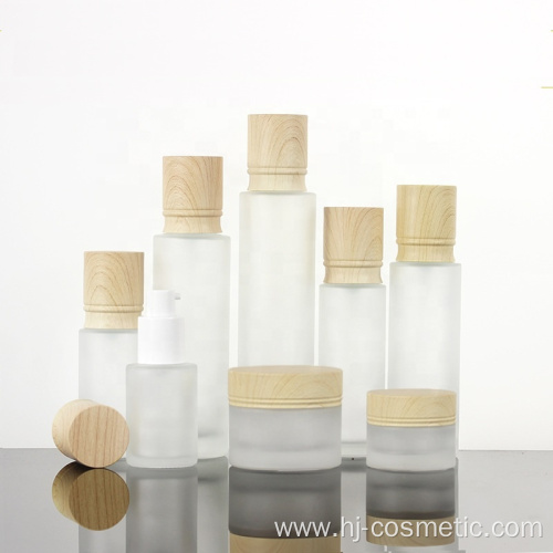 High-grade Cosmetic transparent Frosted glass bottles/jars with wood grain cap